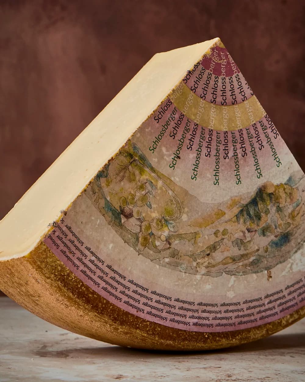 A wedge of Schlossberger cheese
